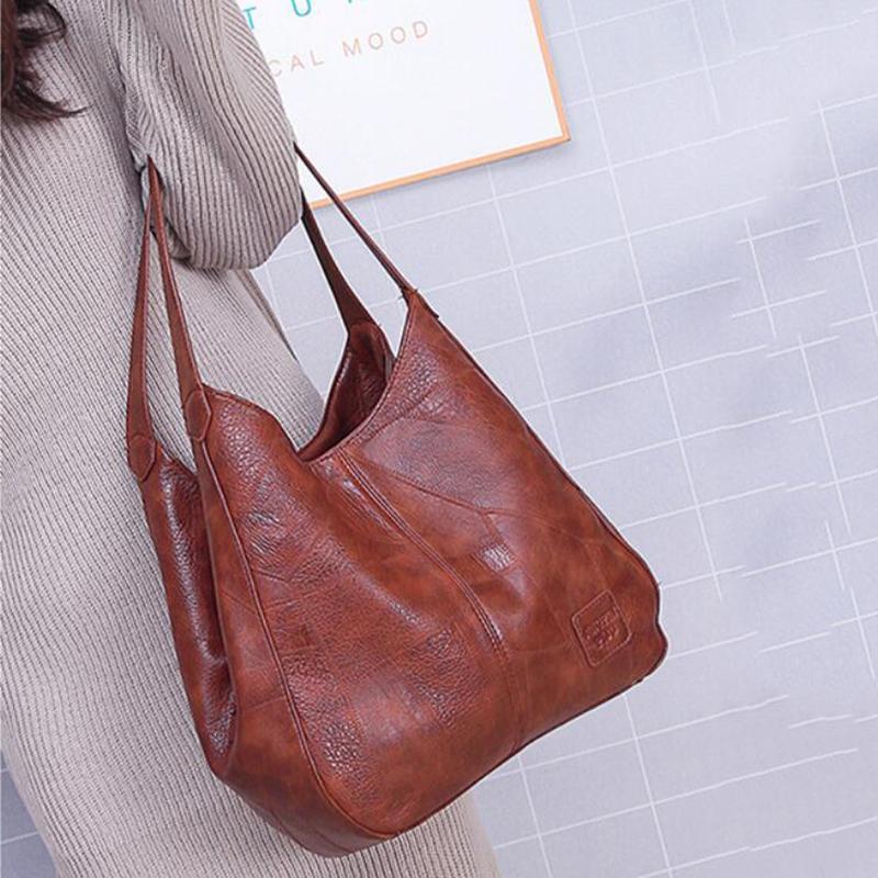 Vintage damväska – Elegant och praktisk accessoar