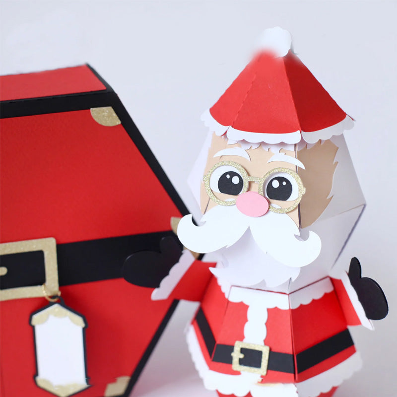 "3D-julklappsskämt med jultomte och popup-box, roliga julaccessoarer med jultomtemotiv för överraskande presenter."