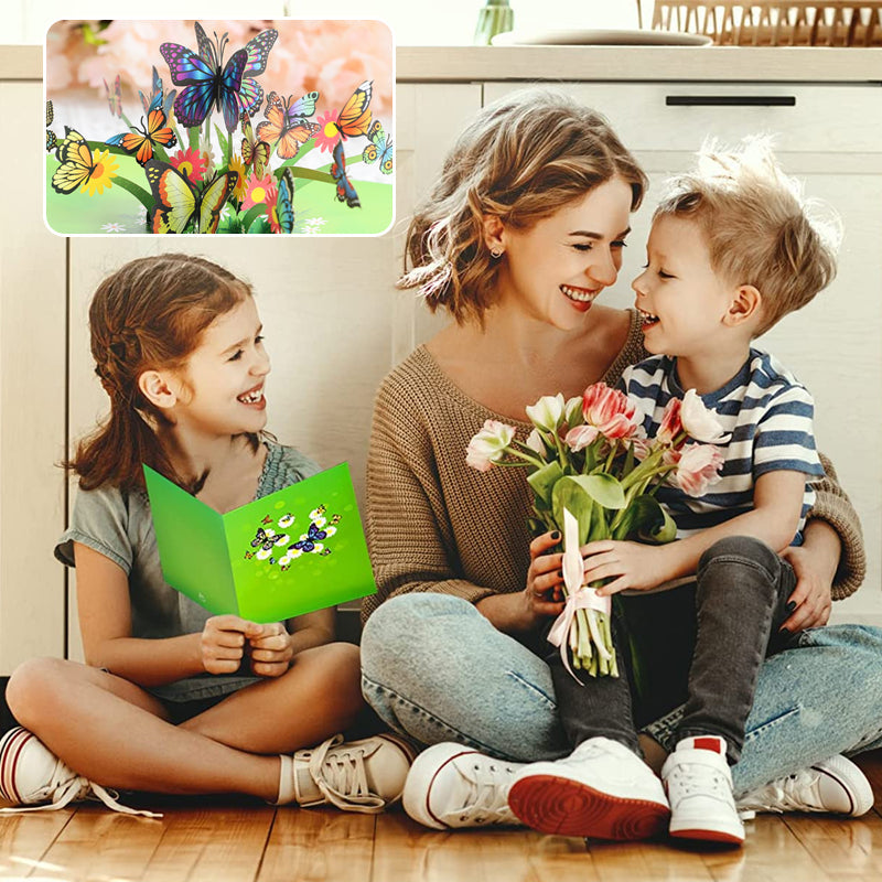 "3D popup-kort prytt med färgglada fjärilar och blommor, perfekt vårpresent i högkvalitativt färgkortspapper."