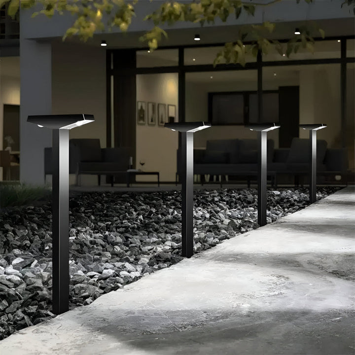 4-pack solcellslampor: Set med 4 energieffektiva LED-lampor för trädgården, perfekt utebelysning med markspjut.