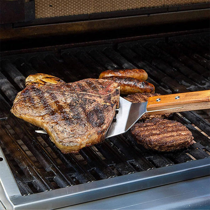 5-i-1 köksverktyg och grillspade med gaffel, brett blad, halkfritt mjukt handtag. Mångsidig och värmetålig design.