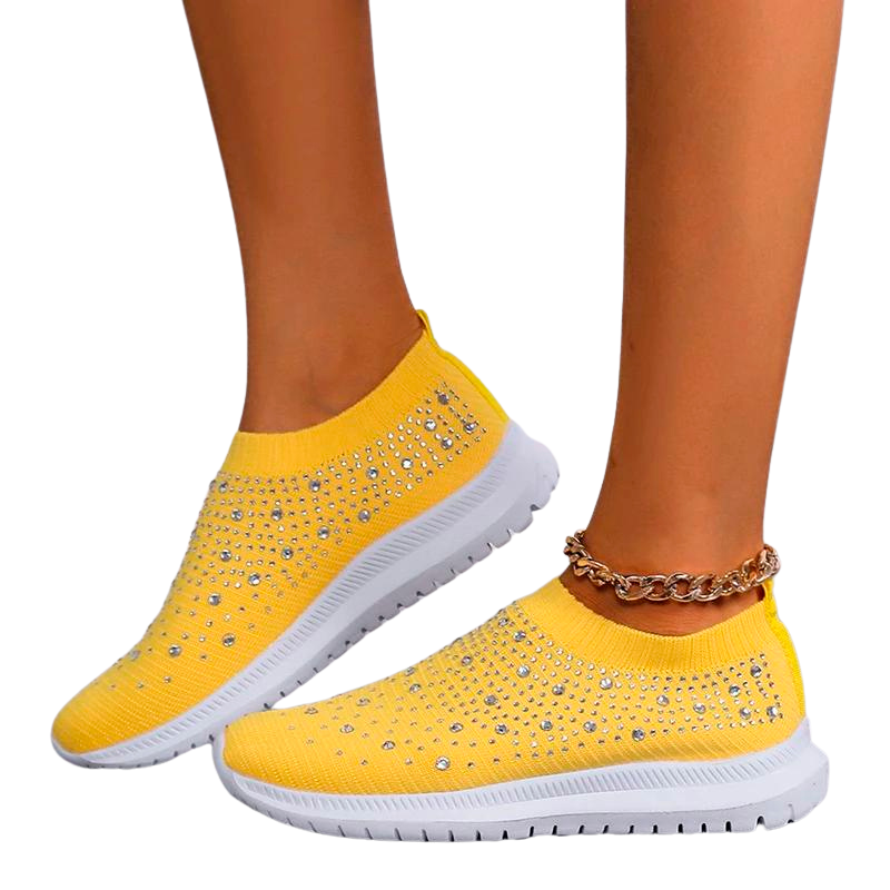 "Andningsaktiva mesh-sneakers för dam med strass, lätt och elegant design med glittrande detaljer och bekväm passform."