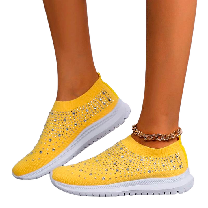 "Andningsaktiva mesh-sneakers för dam med strass, lätt och elegant design med glittrande detaljer och bekväm passform."