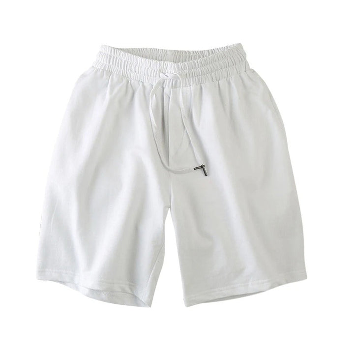 Andningsbara blå herrshorts i polyester med elastiskt midjeband, idealiska för gym och vardag.