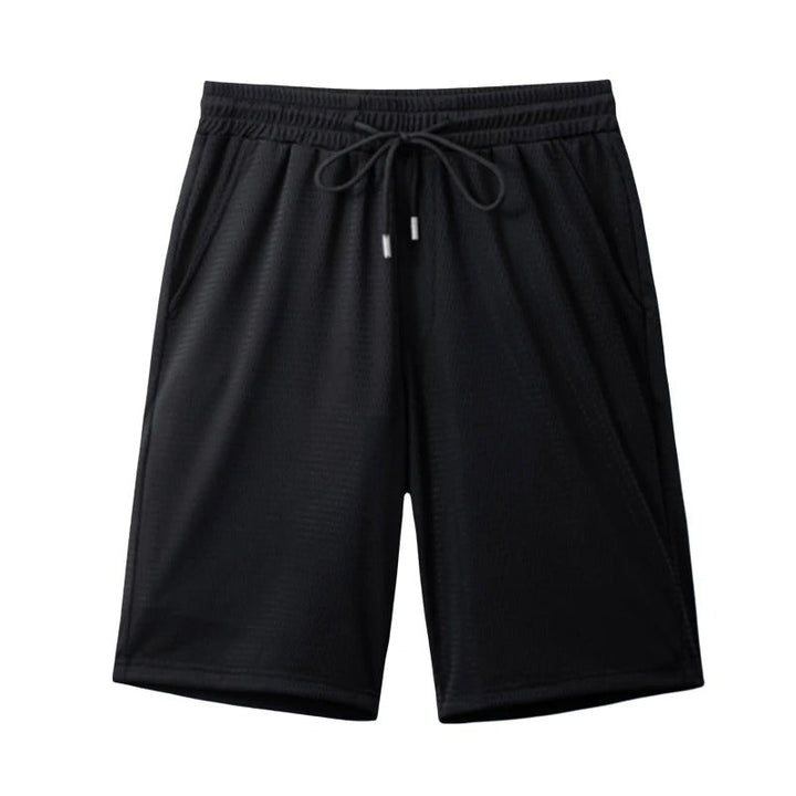 Andningsbara blå herrshorts i polyester med elastiskt midjeband, idealiska för gym och vardag.