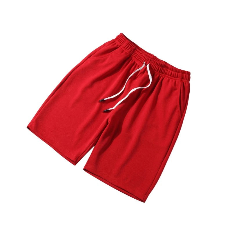 Andningsbara blå herrshorts i polyester med elastiskt midjeband, idealiska för gym och vardag.