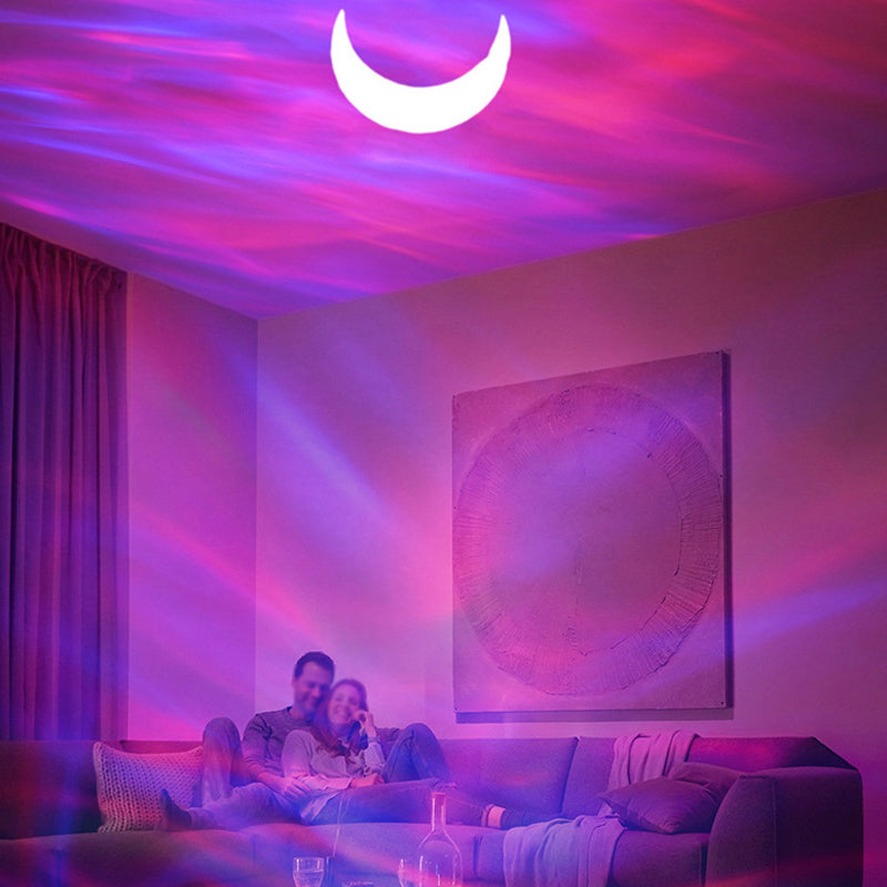 "Aurora-projektor med Bluetooth, projicerar färgglada stjärnljus och norrsken för avkopplande atmosfär i rummet."