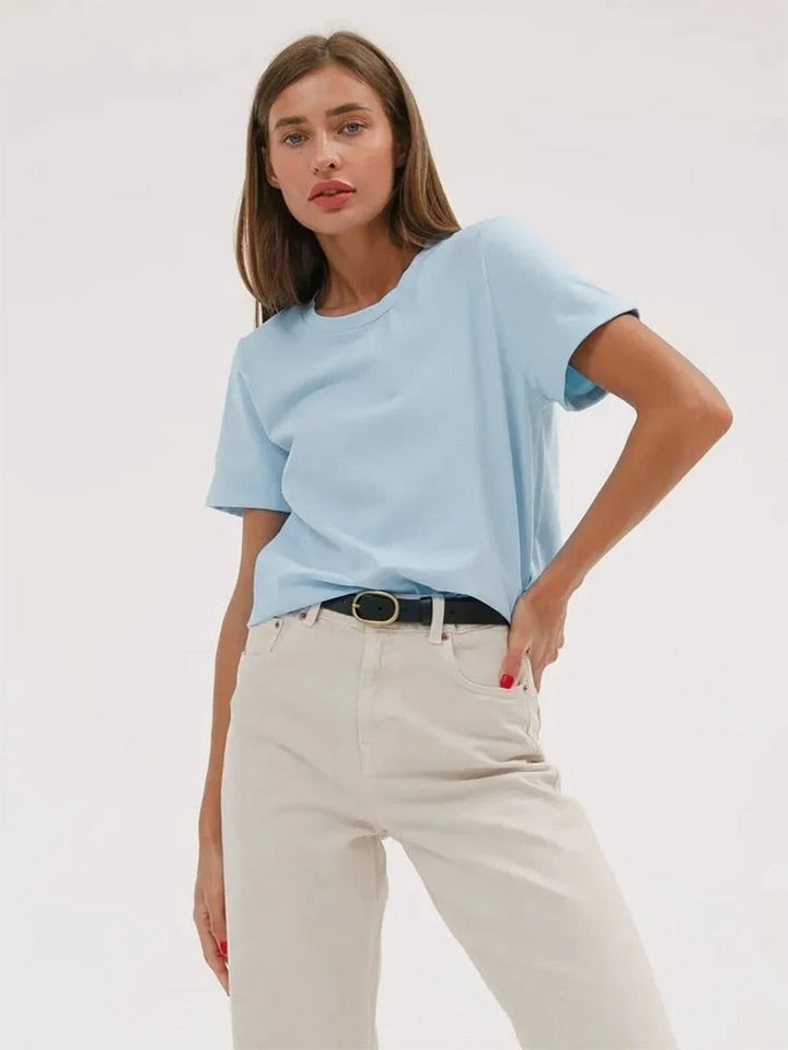 "Basic bomulls-T-shirt för kvinnor, rund hals, i kaffe, vit, svart och khaki. Bekväm passform, perfekt vardagsplagg."
