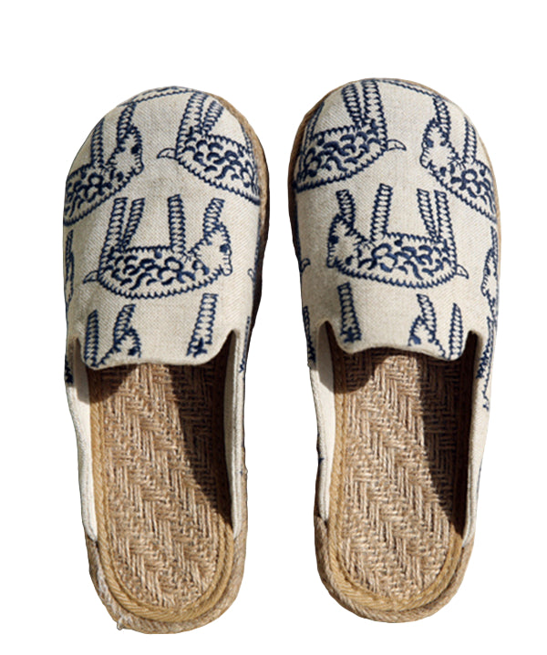 Beige broderade glidsandaler för kvinnor med bekväm vadderad innersula och gummisula, perfekt för stad och strand.
