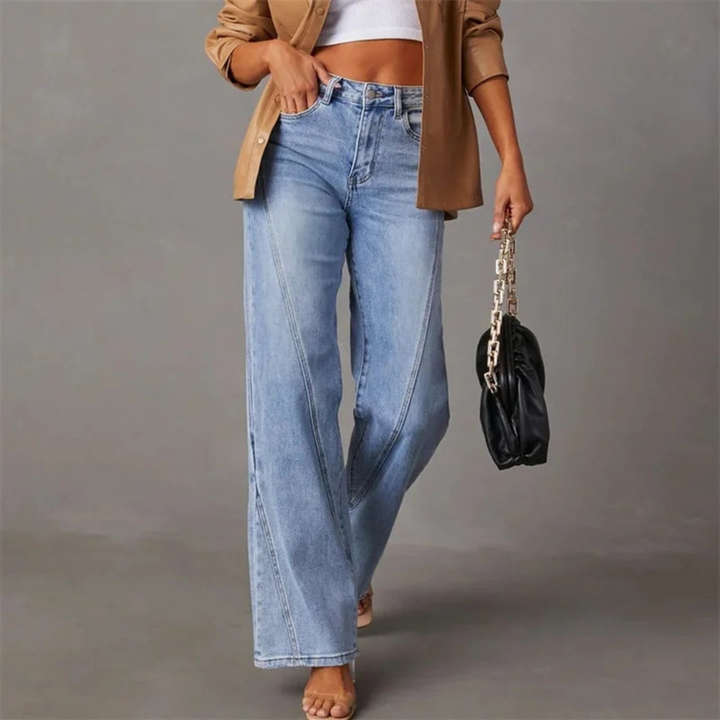 "Blå denim högmidjade vida jeans för damer, visar storlekar 34-44, slitstarkt material med klassisk stil"