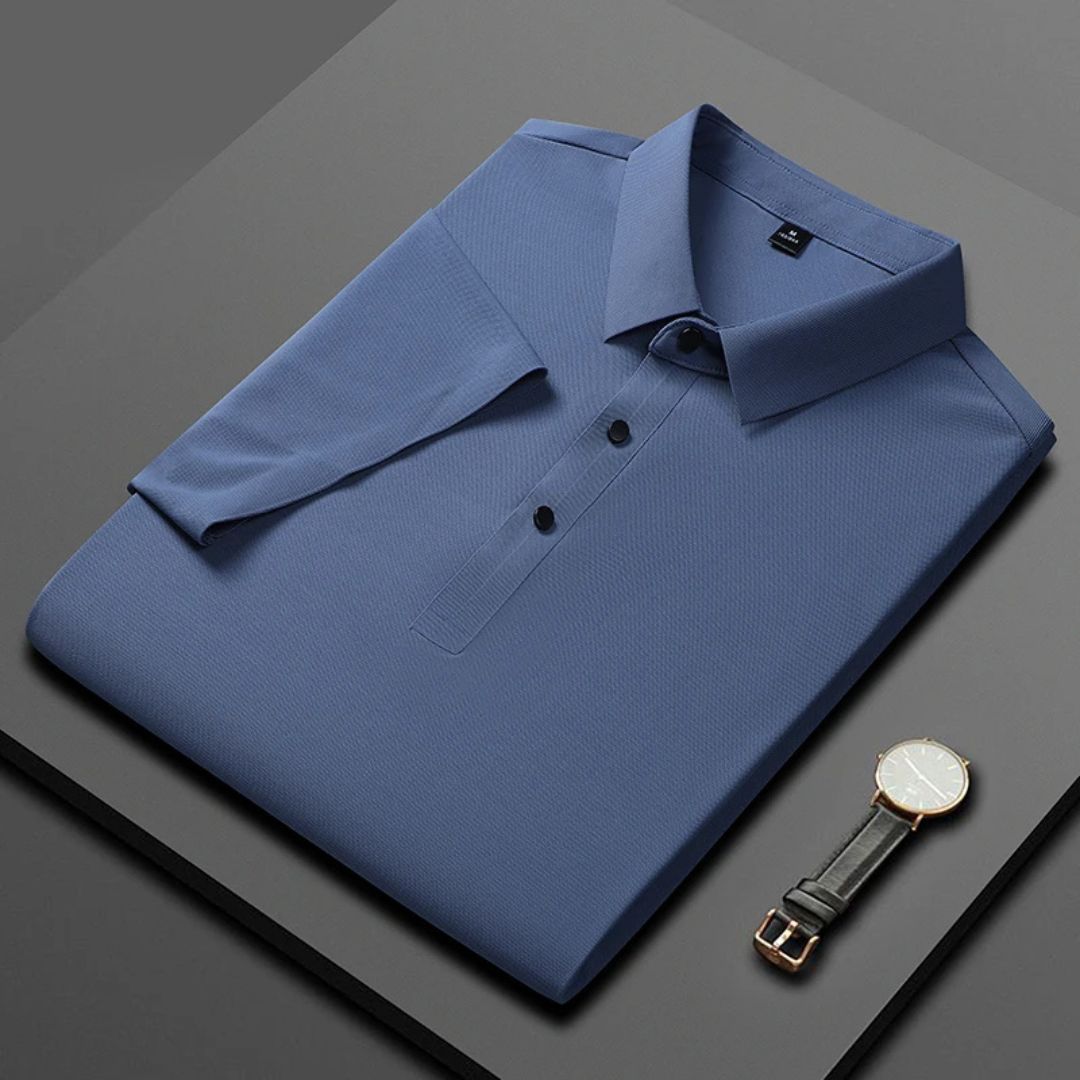Blå herr polo t-shirt med fukttransporterande, andningsbart tyg och fyra-vägs stretch, perfekt för stil och komfort.
