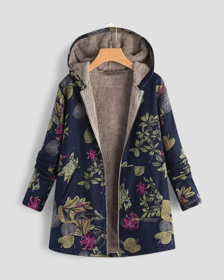 Blommig fleecejacka med huva, kvinnors jacka, framifrån, mjuk, värmande för kallt väder, stil och komfort kombinerade.