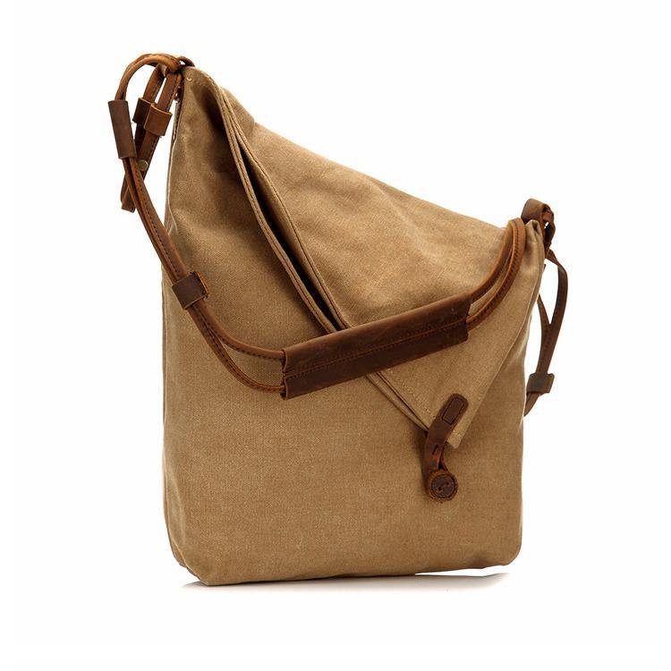 "Bohemisk crossbody-väska i beige canvas och läder, handväska för kvinnor med stilren och praktisk design."
