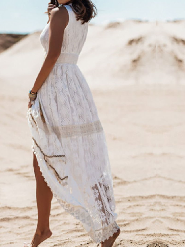 Boho maxiklänning dam i mjukt tyg, avslappnad passform, beige och vit. Perfekt för sommarstil och bekvämt mode.