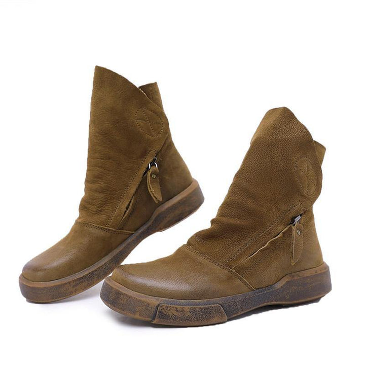 Chokladfärgade damboots i PU-läder med dragkedja och greppvänlig gummisula för stil och komfort.