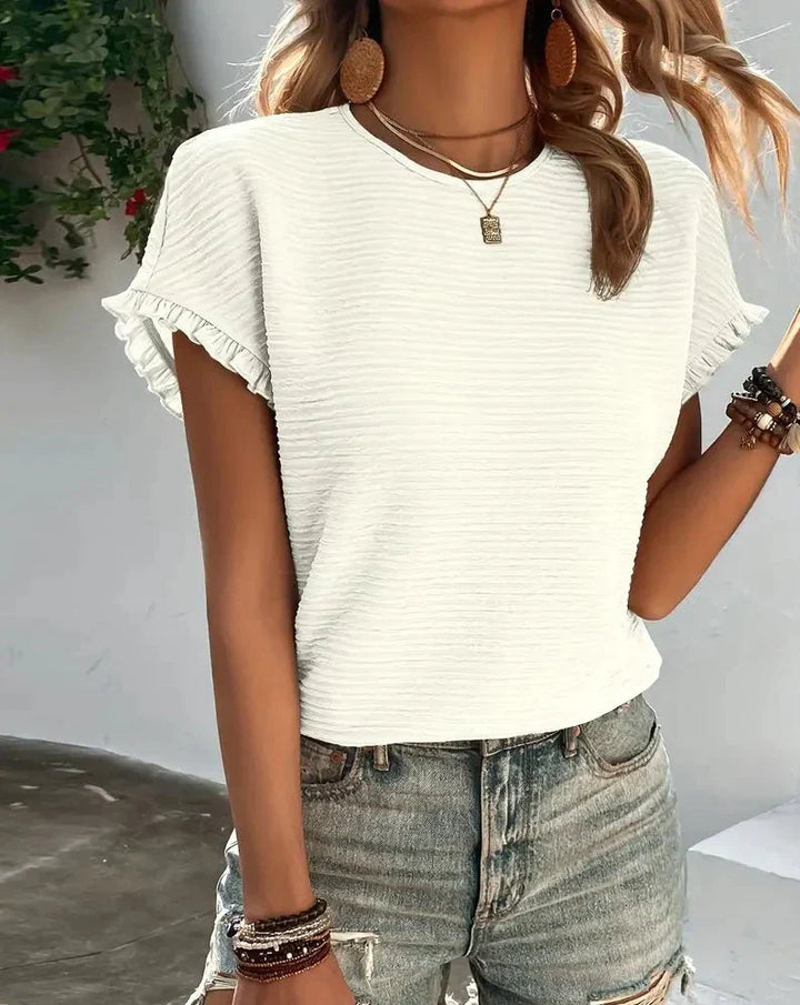 "Dam T-shirt med avslappnad passform, flera färger, bomullsblandning, perfekt för sommar och vardag, lätt och stilren."