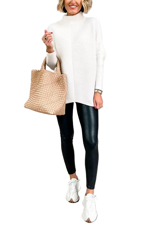"Dam Turtleneck Ribbstickad Tunikatröja i bomull med hög krage och ribbad design i mjukt material, perfekt för kyliga dagar."