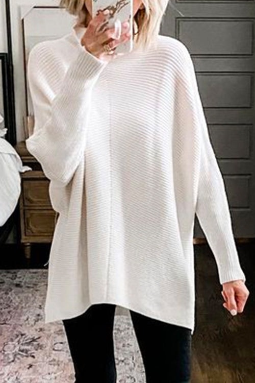 "Dam Turtleneck Ribbstickad Tunikatröja i bomull med hög krage och ribbad design i mjukt material, perfekt för kyliga dagar."