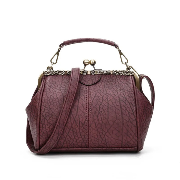 "Dam Vintage Crossbody Väska med minimalistisk design, kompakt och stilren i konstläder med justerbar axelrem."