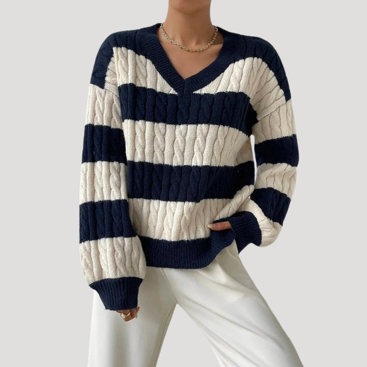 "Dam V-ringad oversize tröja med randiga detaljer, mjukt stickat tyg, djärv design, stil och komfort för alla tillfällen."