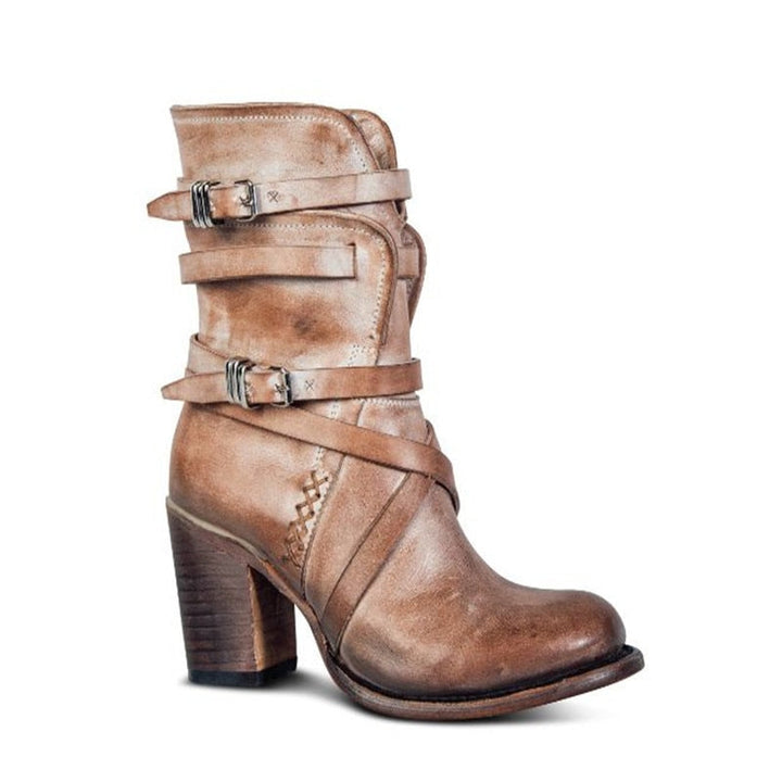 "Dam ankelboots med chunky klack och sliten finish, svartfärgade med dragkedja, erbjuder komfort och vintage elegans."