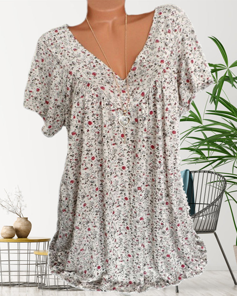 "Dam blus kortärmad V-hals i luftigt material, beige blus för sommarlook, perfekt för vardag och fest."