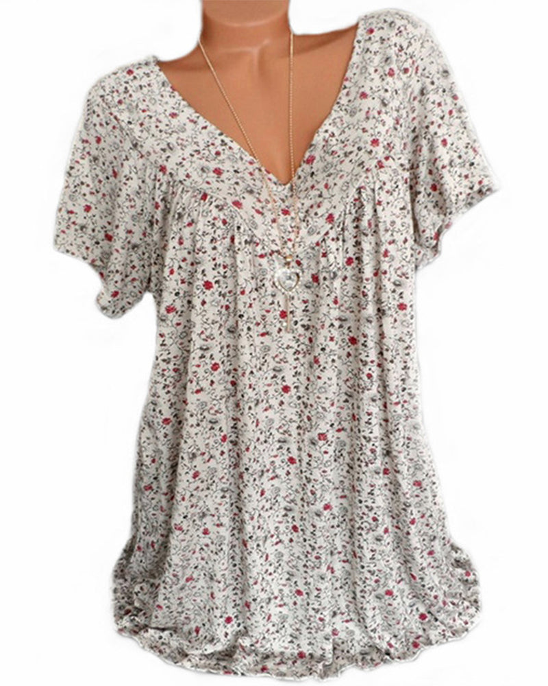 "Dam blus kortärmad V-hals i luftigt material, beige blus för sommarlook, perfekt för vardag och fest."