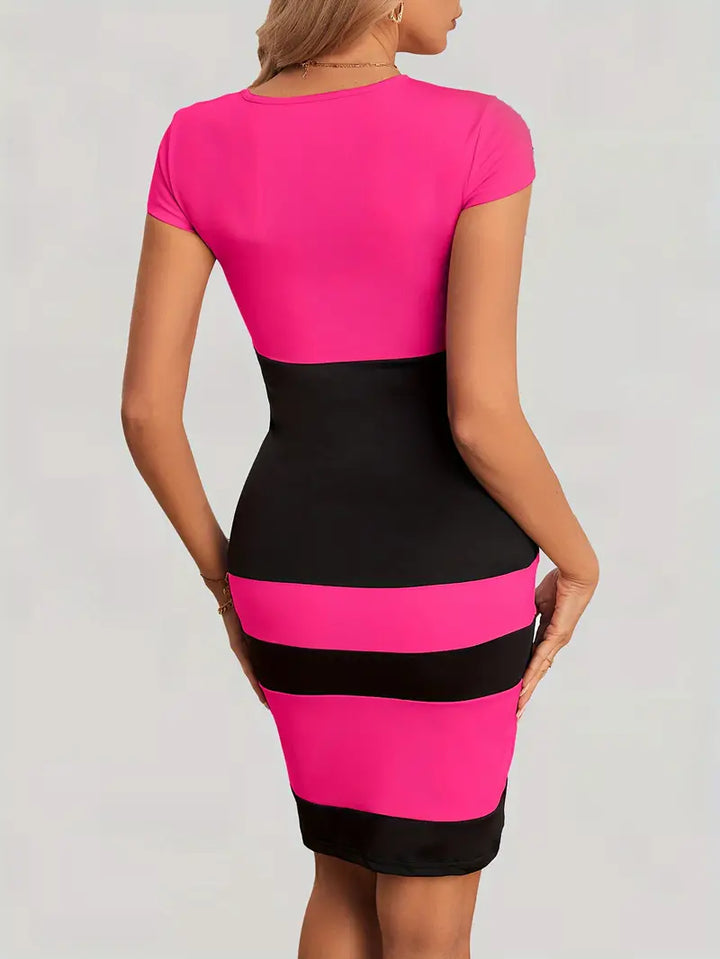 "Dam färgblock klänning i polyester, figur-hugging design, visar en modern passform med stilren look, perfekt för alla tillfä
