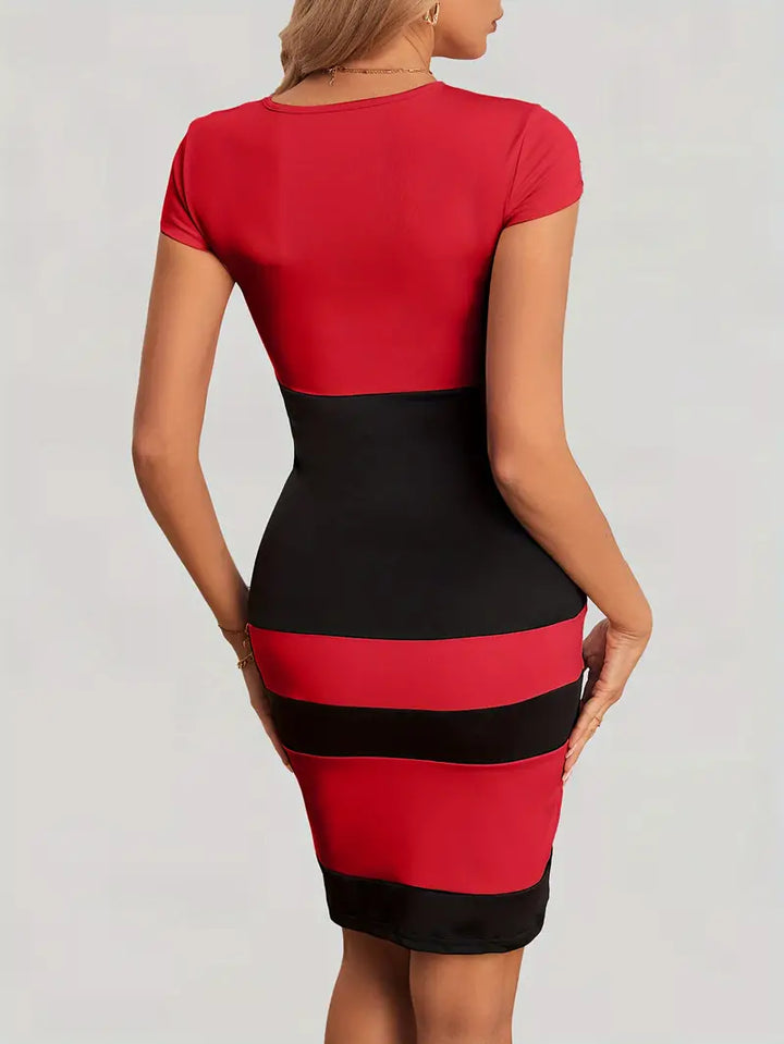 "Dam färgblock klänning i polyester, figur-hugging design, visar en modern passform med stilren look, perfekt för alla tillfä
