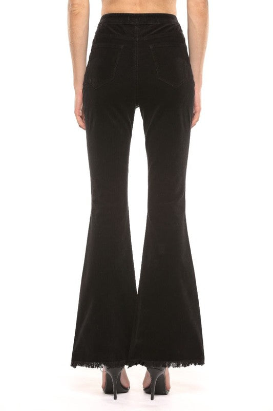 "Dam högmidjade svarta corduroy super flare jeans, retro och modern stil, smickrande passform, dramatisk flare."