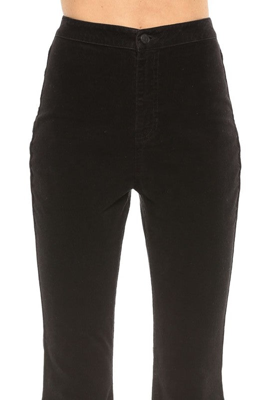 "Dam högmidjade svarta corduroy super flare jeans, retro och modern stil, smickrande passform, dramatisk flare."