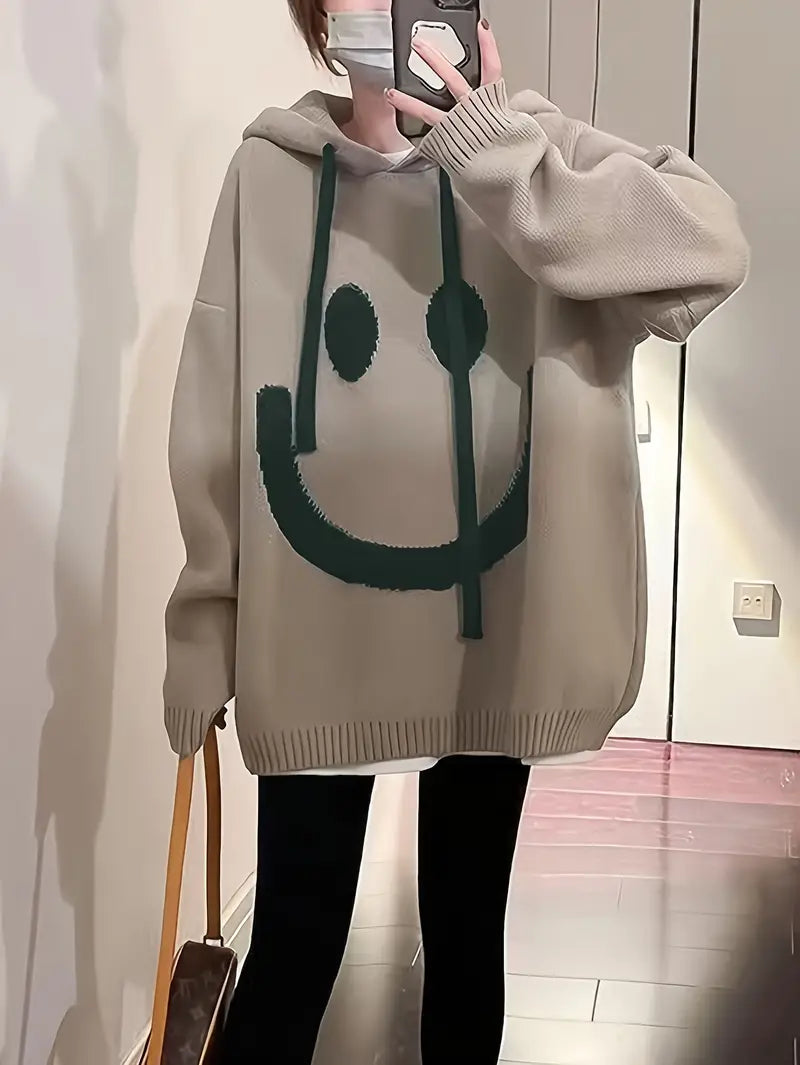 "Dam hoodie med leendedesign, justerbar sladd, mjuk bomullsblandning. Perfekt för vår och höst. Sprider glädje och stil."
