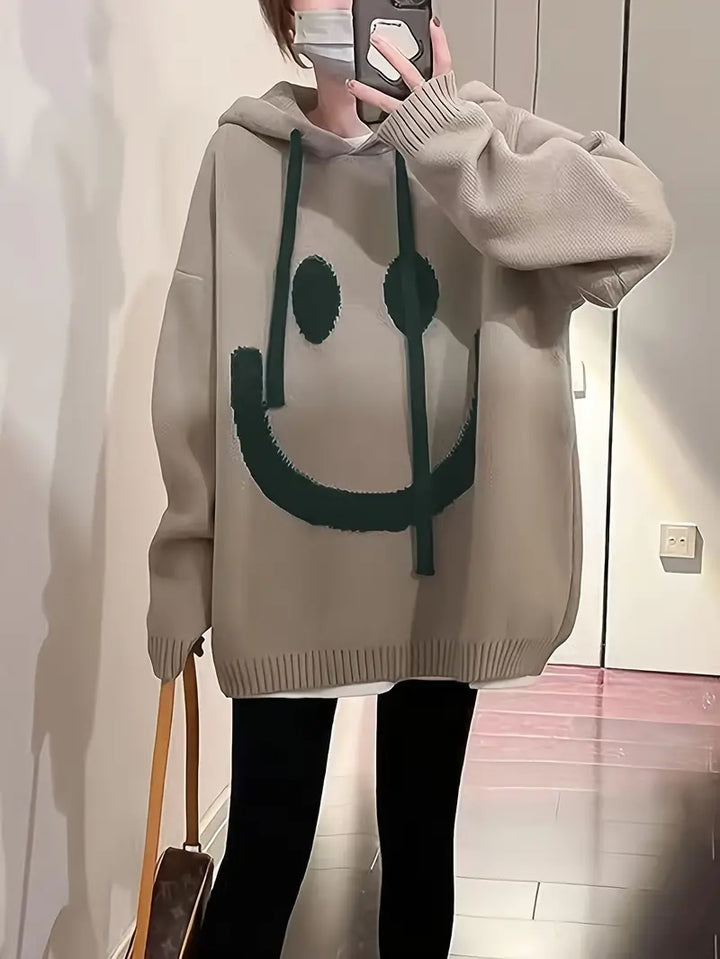 "Dam hoodie med leendedesign, justerbar sladd, mjuk bomullsblandning. Perfekt för vår och höst. Sprider glädje och stil."