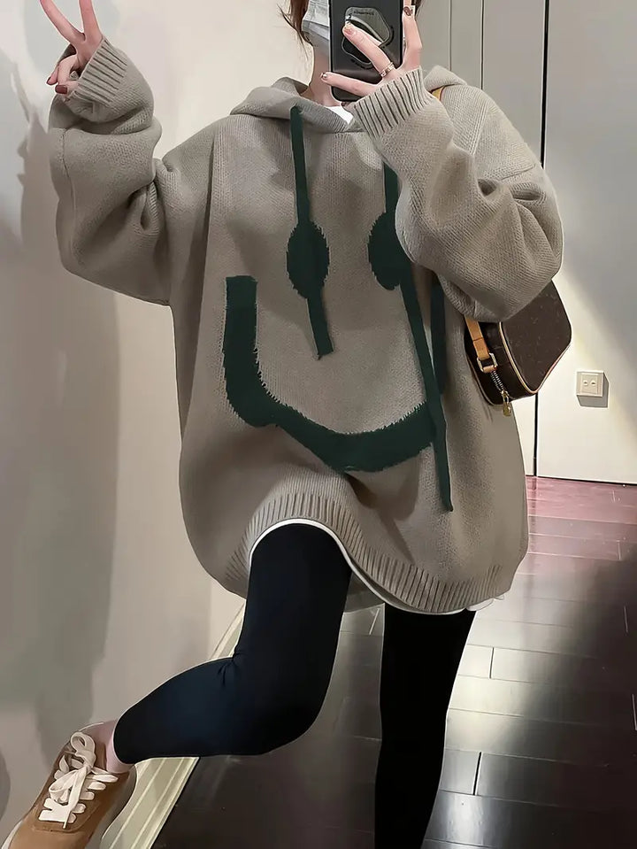 "Dam hoodie med leendedesign, justerbar sladd, mjuk bomullsblandning. Perfekt för vår och höst. Sprider glädje och stil."