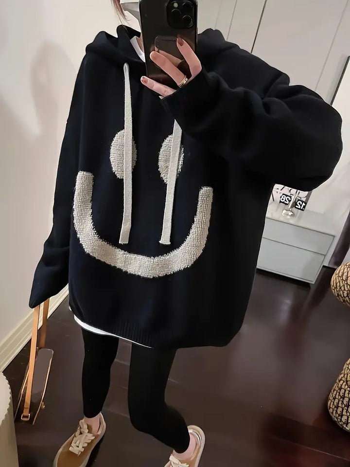 "Dam hoodie med leendedesign, justerbar sladd, mjuk bomullsblandning. Perfekt för vår och höst. Sprider glädje och stil."