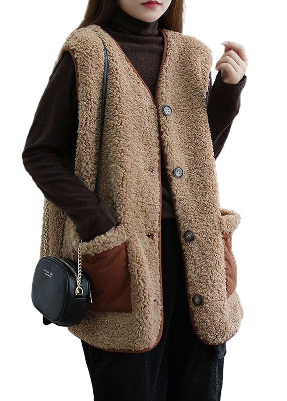 Dam khaki blusväst med knappfickor fram, löskragad design, perfekt för lager-på-lager styling och olika kroppstyper.