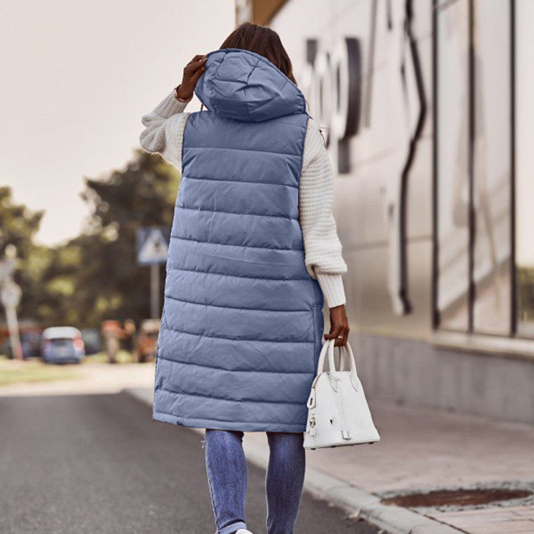 "Dam lång hoodie i urban stil, avslappnad passform, värmande material, perfekt för trendig och bekväm stadsklädsel."