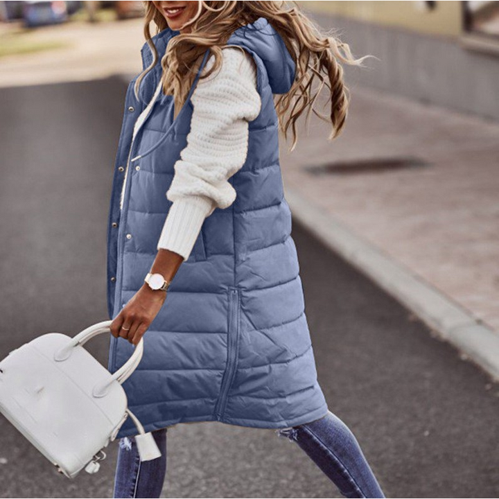 "Dam lång hoodie i urban stil, avslappnad passform, värmande material, perfekt för trendig och bekväm stadsklädsel."