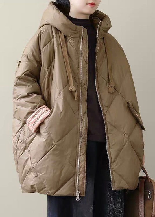 "Dam lång pufferjacka, boho stil, vintrig look, extra värme och komfort, kvinnors mode, elegant och funktionell design."