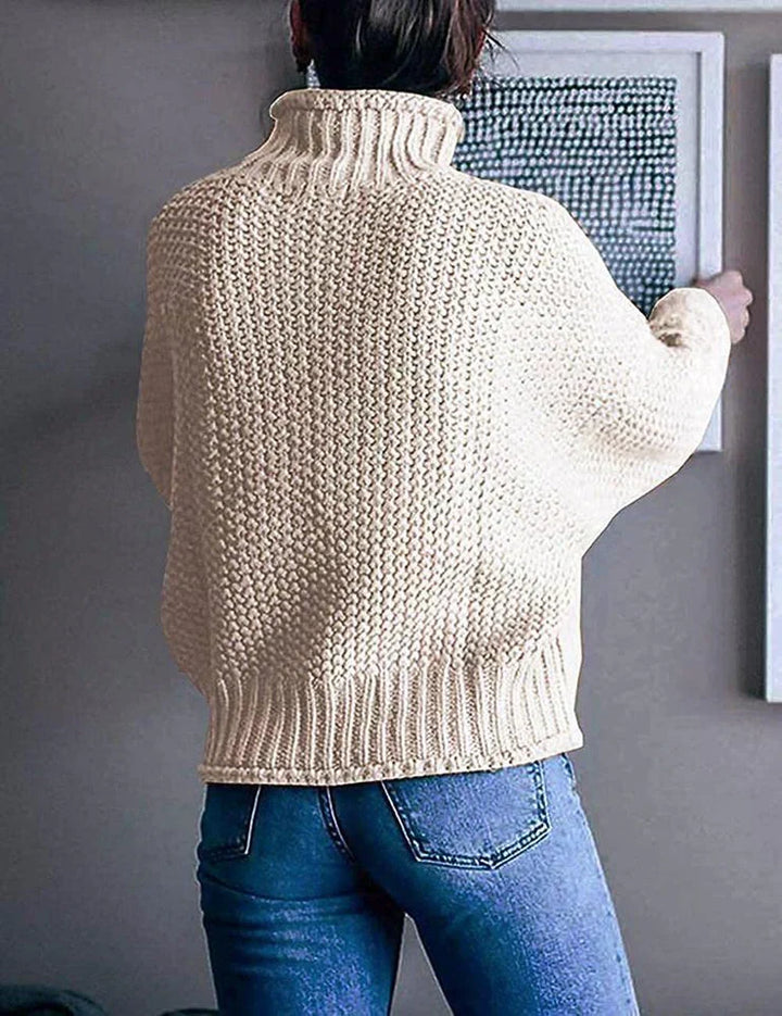 "Dam långärmad baströja i bomull-polyester mix, visad framifrån. Minimalistisk design för vardag och arbete."