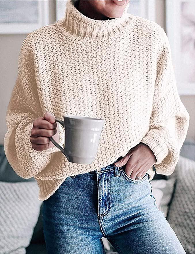 "Dam långärmad baströja i bomull-polyester mix, visad framifrån. Minimalistisk design för vardag och arbete."
