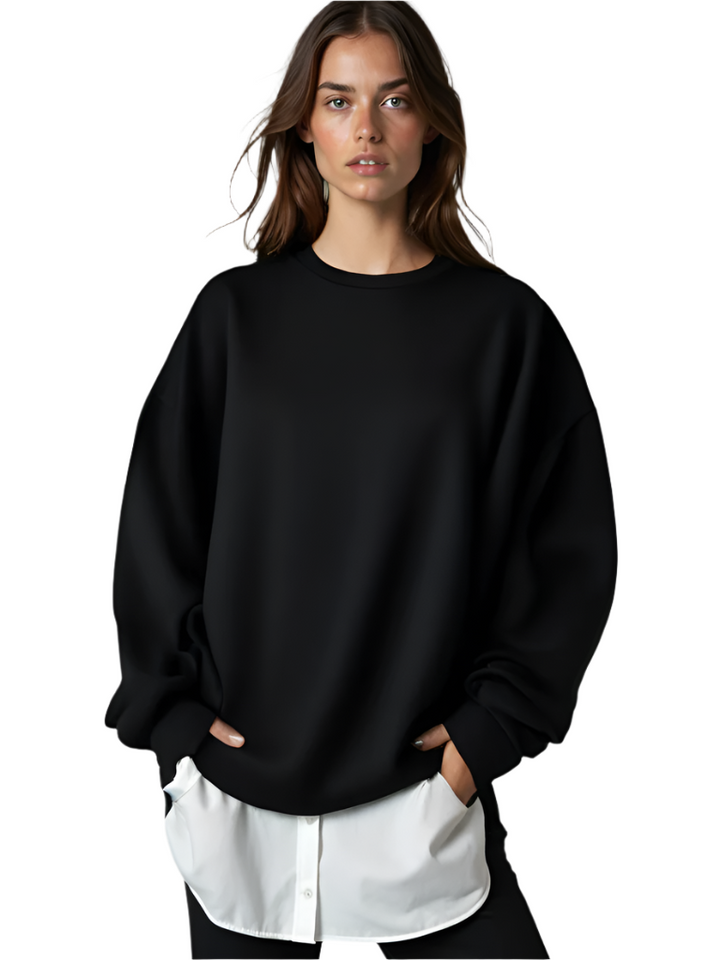 "Dam oversized tröja i mjukt, luftigt material, flera färger, oversize-passform, minimalistisk design för stil och komfort."