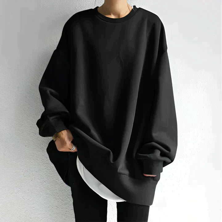 "Dam oversized tröja i mjukt, luftigt material, flera färger, oversize-passform, minimalistisk design för stil och komfort."