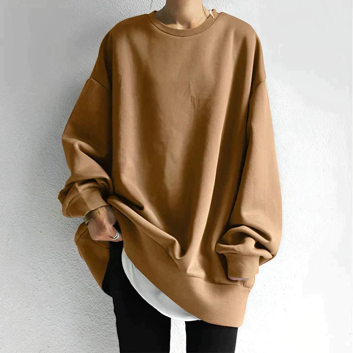 "Dam oversized tröja i mjukt, luftigt material, flera färger, oversize-passform, minimalistisk design för stil och komfort."