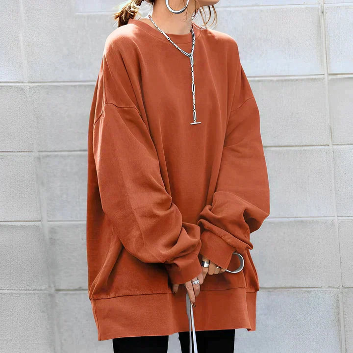 "Dam oversized tröja i mjukt, luftigt material, flera färger, oversize-passform, minimalistisk design för stil och komfort."