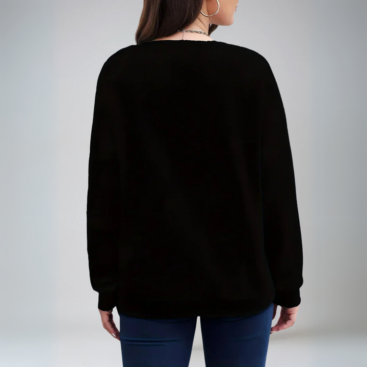 "Dam pullover med hjärtmotiv i mjuk tyg, charmig gradient och välsittande passform, idealisk för kalla dagar."