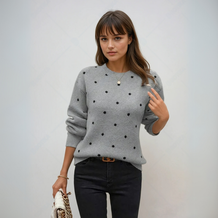 "Dam pullover med polka dots i mjuk stickad material, chic design, smickrande passform, perfekt för alla tillfällen."