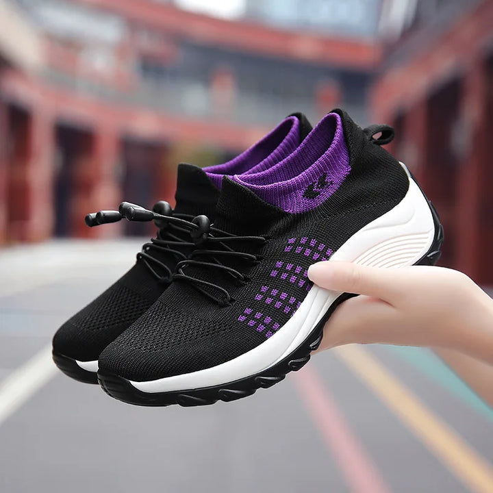 "Dam sneakers med sportig design, andningsbart mesh och tjock sula, idealiska för träning och vardaglig användning."