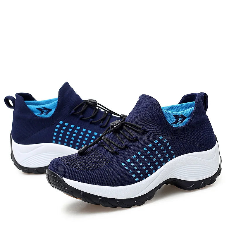 "Dam sneakers med sportig design, andningsbart mesh och tjock sula, idealiska för träning och vardaglig användning."