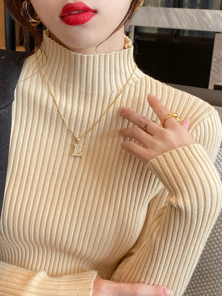 Dam stickad turtleneck tröja; elegant långärmad design, mjuk och värmande i flera stilfulla färger för komfort och stil.